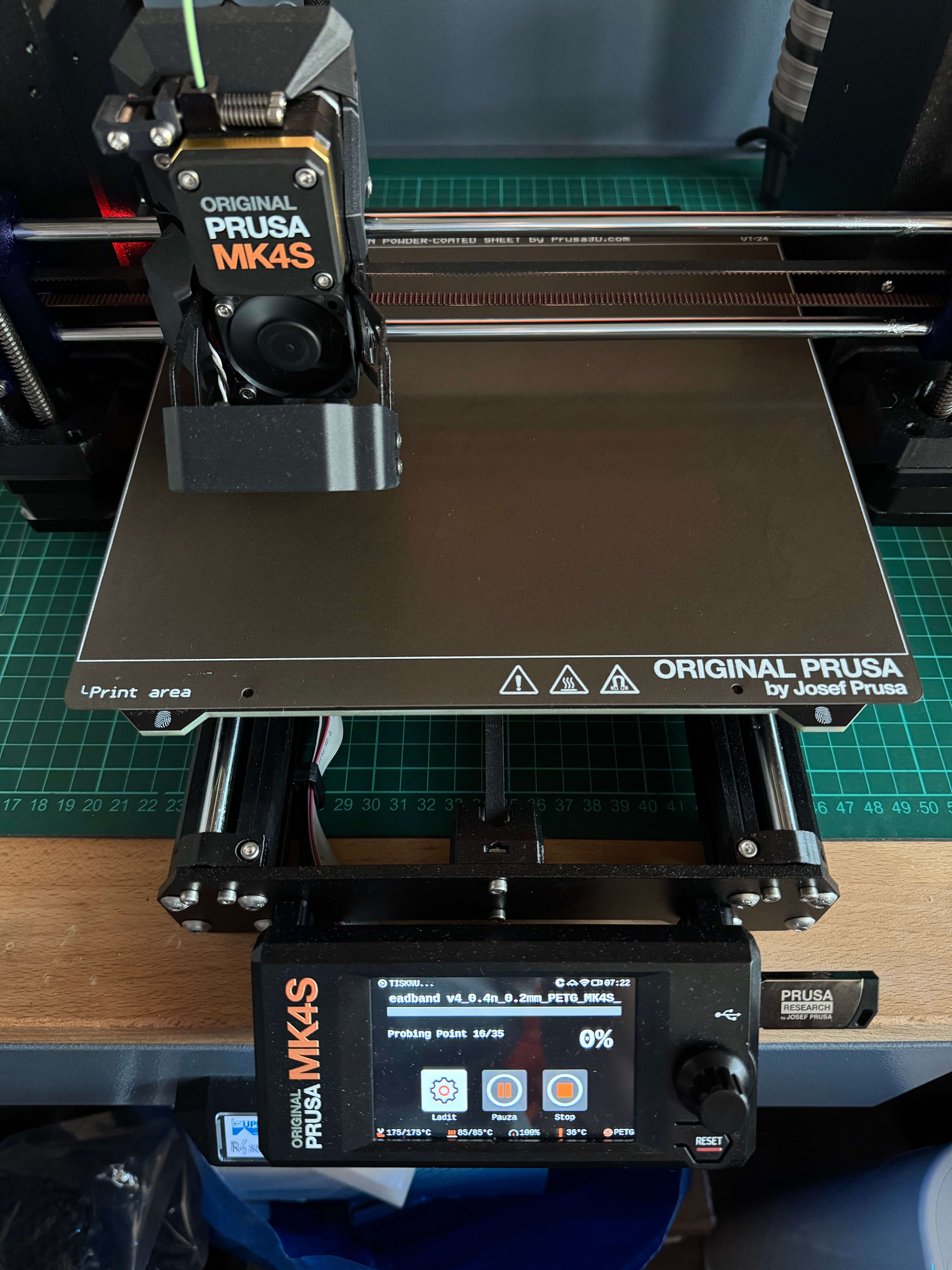 Printer calibrating the z-offset by tapping the bed with nozzle